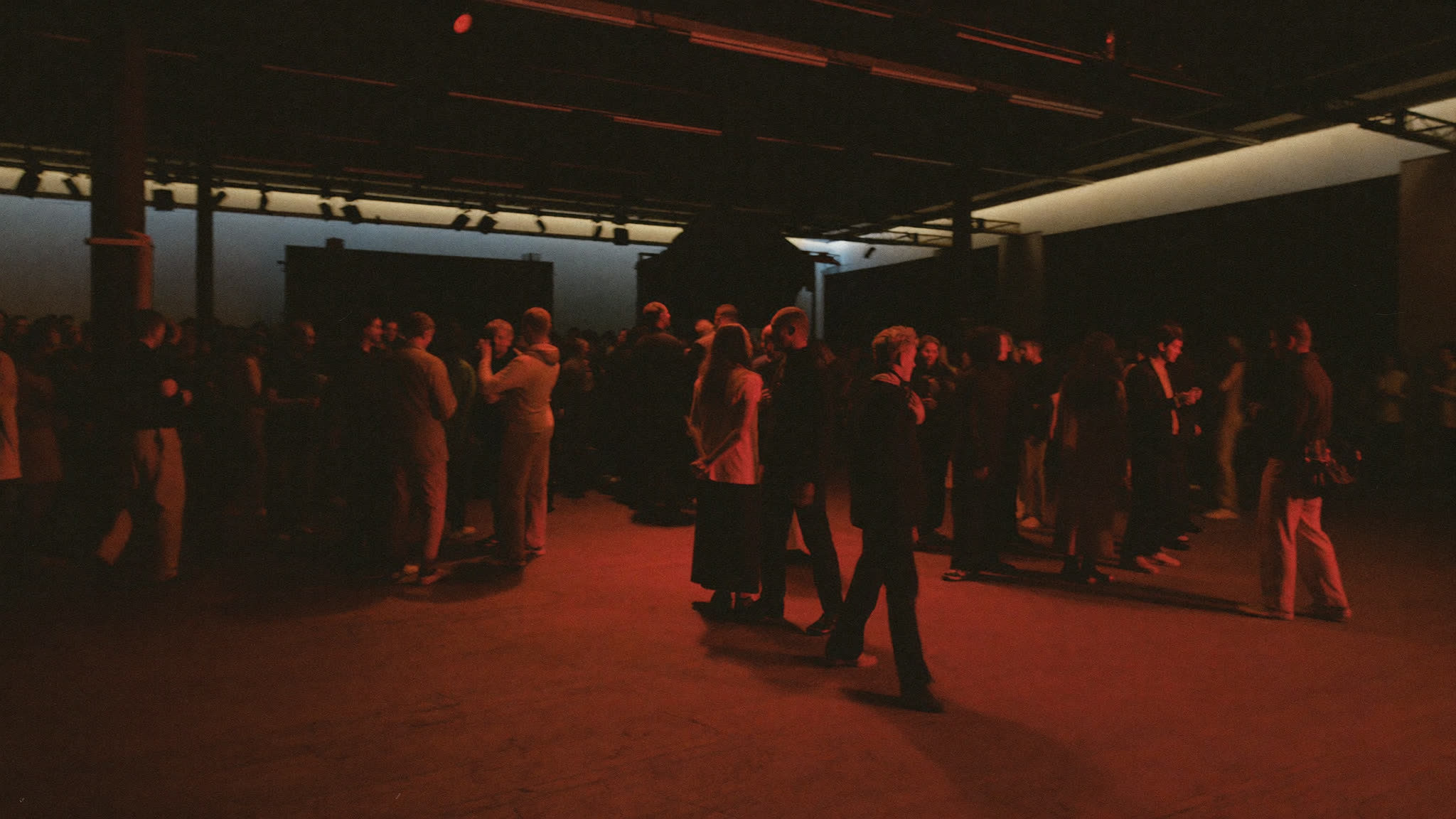 A social event in the Studio at The Black-E, guests socialising