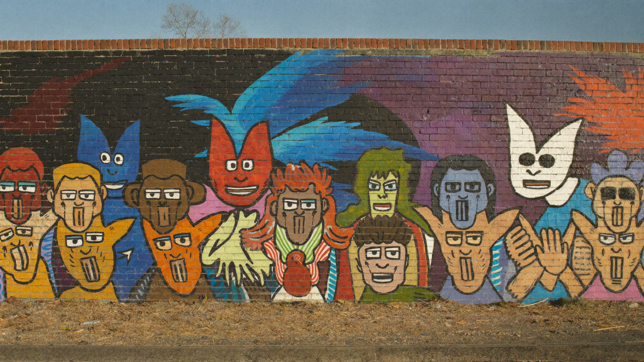 A vibrant community mural celebrating creativity at The Black-E